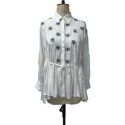 embroidered top with flare hem